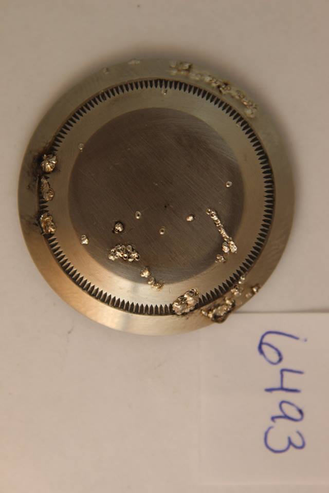 Badly damaged Rolex case in process of laser welding.